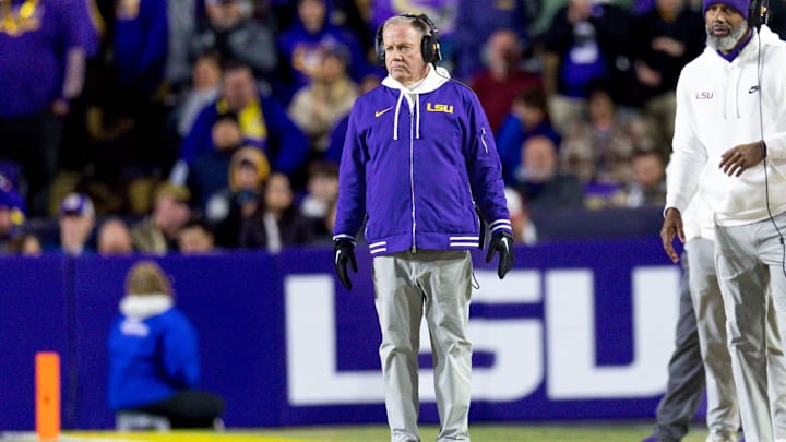 Nov 30, 2024; Baton Rouge, Louisiana, USA; LSU Tigers head coach Brian Kelly looks on against the Oklahoma Sooners during the fourth quarter at Tiger Stadium. Mandatory Credit: Stephen Lew-Imagn Images Nov 30, 2024; Baton Rouge, Louisiana, USA; LSU Tigers head coach Brian Kelly looks on against the Oklahoma Sooners during the fourth quarter at Tiger Stadium. Mandatory Credit: Stephen Lew-Imagn Images