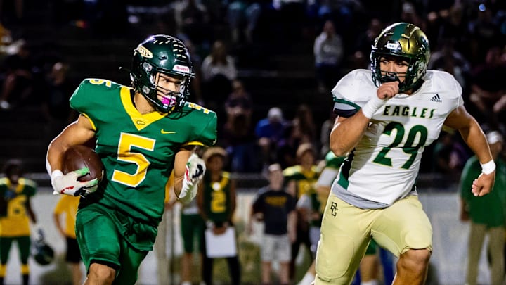 AC Reynolds sophomore running back Max Guest runs the ball against Rabun Gap-Nacoochee Friday night at AC Reynolds High School in Asheville, NC. Rabun Gap-Nacoochee defeated AC Reynolds 37-28. A

Reynolds football Rabun Gap Max Guest