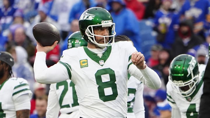 Dec 29, 2024; Orchard Park, New York, USA; New York Jets quarterback Aaron Rodgers (8) warms up prior to the game against the Buffalo Bills at Highmark Stadium. Mandatory Credit: Gregory Fisher-Imagn Images