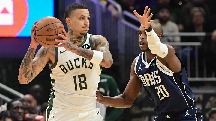 Mar 31, 2026; Milwaukee, Wisconsin, USA; Milwaukee Bucks forward Kyle Kuzma (18) looks for a shot against Dallas Mavericks forward Khris Middleton (20) in the first quarter at Fiserv Forum. Mandatory Credit: Benny Sieu-Imagn Images Mar 31, 2026; Milwaukee, Wisconsin, USA; Milwaukee Bucks forward Kyle Kuzma (18) looks for a shot against Dallas Mavericks forward Khris Middleton (20) in the first quarter at Fiserv Forum. Mandatory Credit: Benny Sieu-Imagn Images