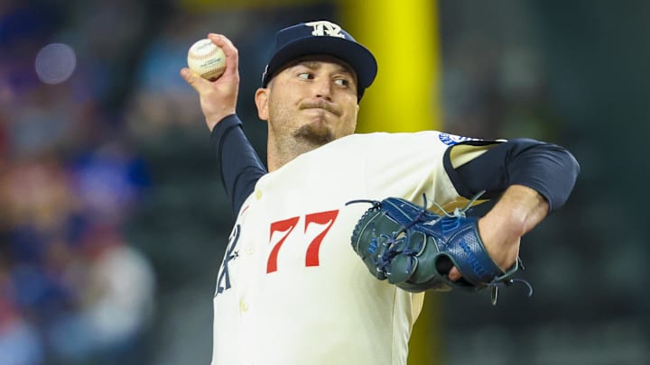 Mar 28, 2025; Arlington, Texas, USA;  Texas Rangers relief pitcher Luke Jackson (77) throws during the ninth inning against the Boston Red Sox at Globe Life Field. 