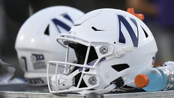 Sep 18, 2021; Durham, North Carolina, USA; A Northwestern Wildcats helmet sits on an equipment chest during the fourth quarter at Wallace Wade Stadium. Mandatory Credit: William Howard-Imagn Images
