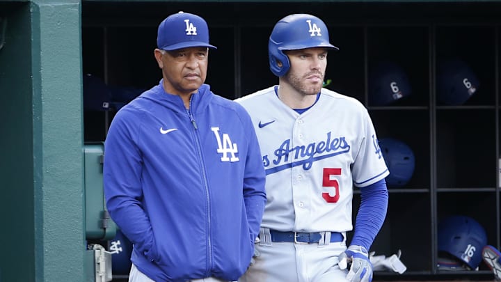 Sep 10, 2023; Washington, District of Columbia, USA; Los Angeles Dodgers manager Dave Roberts (30) and Dodgers first baseman Freddie Freeman (5) look on from the dugout durining the eighth inning against the Washington Nationals at Nationals Park. Mandatory Credit: Amber Searls-Imagn Images