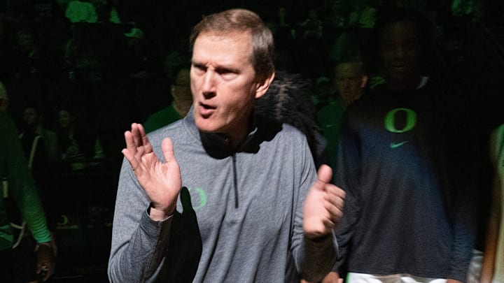 Oregon coach Dana Altman brings his team together before their game against Troy at Matthew Knight Arena in Eugene.
