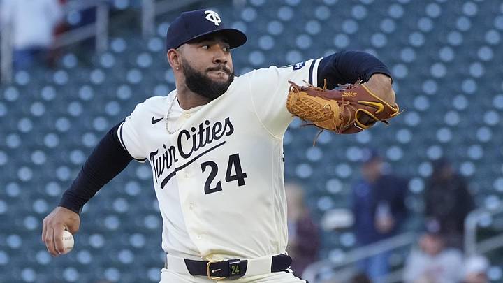 May 13, 2026; Minneapolis, Minnesota, USA; Minnesota Twins pitcher Simeon Woods Richardson (24) throws to the Miami Marlins in the first inning at Target Field. Mandatory Credit: Bruce Kluckhohn-Imagn Images