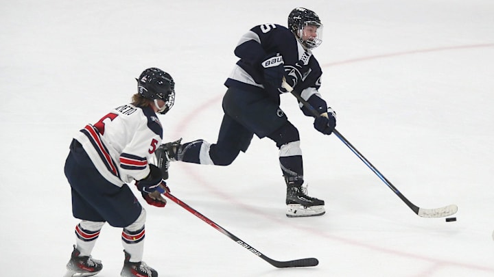 Penn State s Tessa Janecke (15) shoots the puck during the third period against the Robert Morris Colonials on February 10, 2024 at Clearview Arena in Pittsburgh, PA. Penn State s Tessa Janecke (15) shoots the puck during the third period against the Robert Morris Colonials on February 10, 2024 at Clearview Arena in Pittsburgh, PA.
