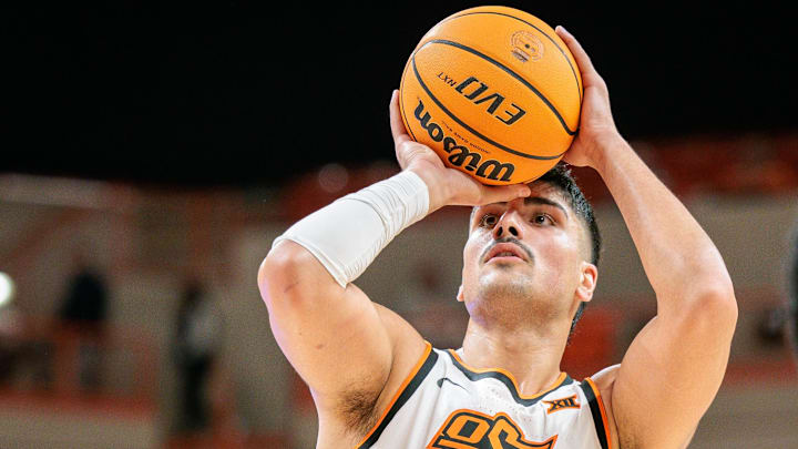 Dec 2, 2025; Stillwater, Oklahoma, USA; Oklahoma State Cowboys center Parsa Fallah (22) shoots the ball during the first half against the Sam Houston Bearkats at Gallagher-Iba Arena. Mandatory Credit: William Purnell-Imagn Images Dec 2, 2025; Stillwater, Oklahoma, USA; Oklahoma State Cowboys center Parsa Fallah (22) shoots the ball during the first half against the Sam Houston Bearkats at Gallagher-Iba Arena. Mandatory Credit: William Purnell-Imagn Images