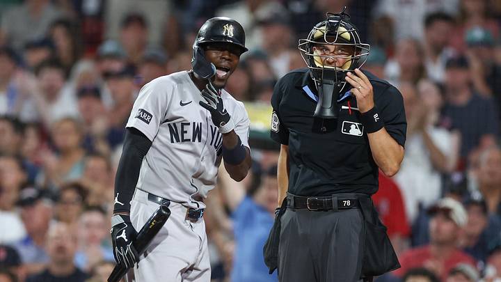 Jun 28, 2026; Boston, Massachusetts, USA; New York Yankees second baseman Jazz Chisholm Jr (13) argues with home plate umpire Adam Hamari (78) during the sixth inning against the Boston Red Sox at Fenway Park. Mandatory Credit: Paul Rutherford-Imagn Images