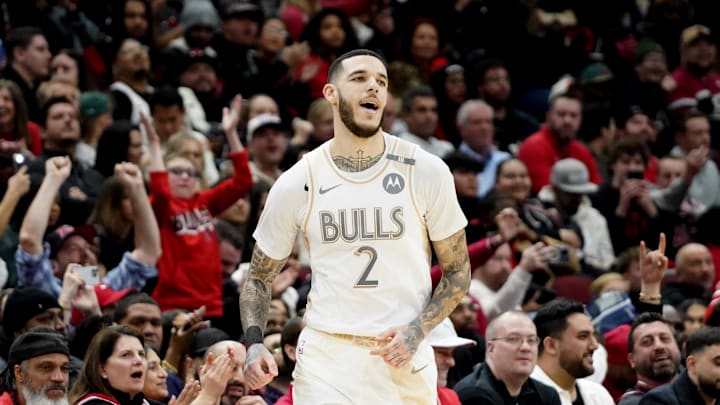 Jan 4, 2025; Chicago, Illinois, USA; Chicago Bulls guard Lonzo Ball (2) reacts after making a three point basket against the New York Knicks during the second half at United Center. Mandatory Credit: David Banks-Imagn Images