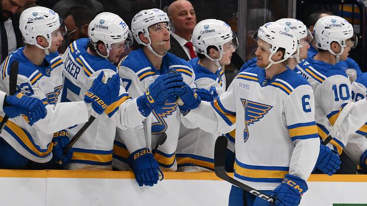 Feb 2, 2026; Nashville, Tennessee, USA;  St. Louis Blues defenseman Philip Broberg (6) celebrates with his teammates after scoring a goal against the Nashville Predators during the second period at Bridgestone Arena. Mandatory Credit: Steve Roberts-Imagn Images