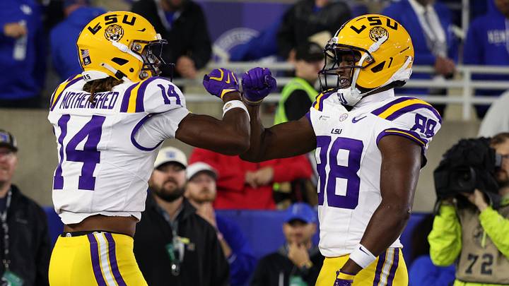 Oct 10, 2026; Lexington, Kentucky, USA; LSU Tigers wide receiver Roman Mothershed (14) celebrates with wide receiver Malik Elzy (88) during the fourth quarter against the Kentucky Wildcats at Kroger Field. Mandatory Credit: Jordan Prather-Imagn Images Oct 10, 2026; Lexington, Kentucky, USA; LSU Tigers wide receiver Roman Mothershed (14) celebrates with wide receiver Malik Elzy (88) during the fourth quarter against the Kentucky Wildcats at Kroger Field. Mandatory Credit: Jordan Prather-Imagn Images