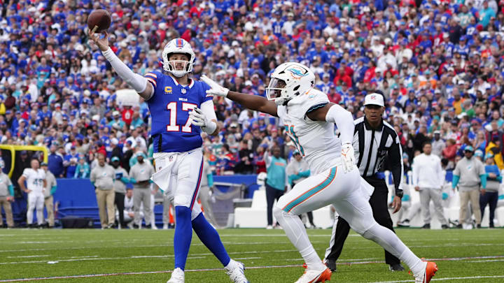 Buffalo Bills quarterback Josh Allen (17) throws the ball against Miami Dolphins linebacker Tyus Bowser (51) during the second half at Highmark Stadium in Week 9.