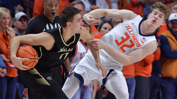 Nov 13, 2024; Champaign, Illinois, USA; Illinois Fighting Illini guard Kasparas Jakucionis (32) defends Oakland Golden Grizzlies guard Jayson Goodrich (11) during the first half at State Farm Center. Mandatory Credit: Ron Johnson-Imagn Images Nov 13, 2024; Champaign, Illinois, USA; Illinois Fighting Illini guard Kasparas Jakucionis (32) defends Oakland Golden Grizzlies guard Jayson Goodrich (11) during the first half at State Farm Center. Mandatory Credit: Ron Johnson-Imagn Images