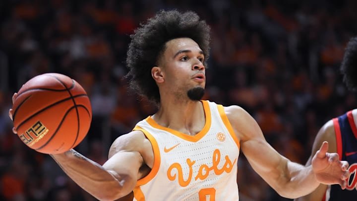 Feb 3, 2026; Knoxville, Tennessee, USA;  Tennessee Volunteers guard Ja'kobi Gillespie (0) passes the ball against the Mississippi Rebels during the first half at Thompson-Boling Arena at Food City Center. Mandatory Credit: Randy Sartin-Imagn Images