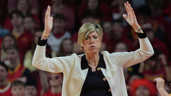 Iowa Hawkeyes women' basketball head coach Jan Jensen reacts during the game against Iowa State in the NCAA women’s basketball Cy-Hawk Series on Dec. 10, 2025, at Hilton Coliseum in Ames, Iowa. Iowa Hawkeyes women' basketball head coach Jan Jensen reacts during the game against Iowa State in the NCAA women’s basketball Cy-Hawk Series on Dec. 10, 2025, at Hilton Coliseum in Ames, Iowa.