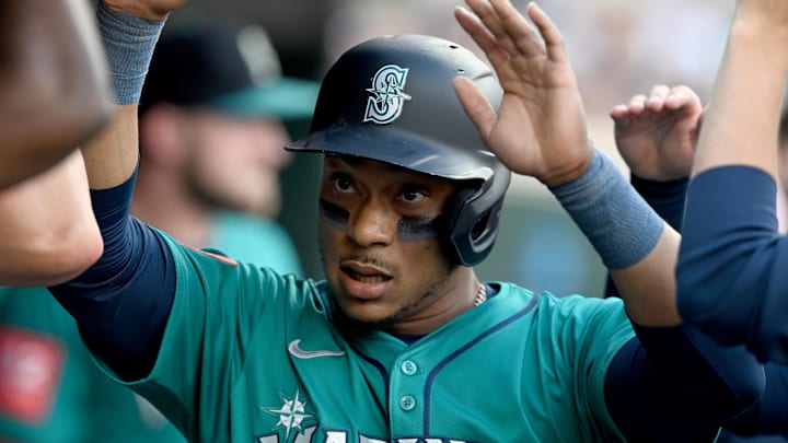 Jul 11, 2025; Detroit, Michigan, USA; Seattle Mariners second baseman Jorge Polanco (7) celebrates in the dugout after scoring a run against the Detroit Tigers in the second inning at Comerica Park. Mandatory Credit: Lon Horwedel-Imagn Images
