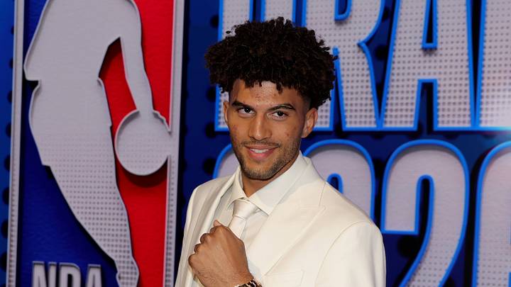 Jun 23, 2026; New York, NY, USA; Draft prospect Cameron Boozer poses for photos on the red carpet before the 2026 NBA draft at Barclays Center. Mandatory Credit: Brad Penner-Imagn Images