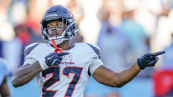 Houston Texans running back Woody Marks (27) signals a first down during the fourth quarter against the Tennessee Titans at Nissan Stadium in Nashville, Tenn., Sunday, Nov. 16, 2025.