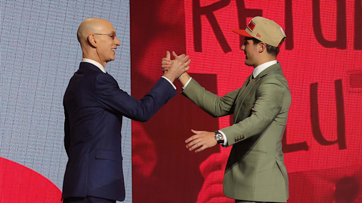 Jun 26, 2024; Brooklyn, NY, USA; Reed Sheppard shakes hands with NBA commissioner Adam Silver after being selected in the first round by the Houston Rockets in the 2024 NBA Draft at Barclays Center. Mandatory Credit: Brad Penner-Imagn Images Jun 26, 2024; Brooklyn, NY, USA; Reed Sheppard shakes hands with NBA commissioner Adam Silver after being selected in the first round by the Houston Rockets in the 2024 NBA Draft at Barclays Center. Mandatory Credit: Brad Penner-Imagn Images