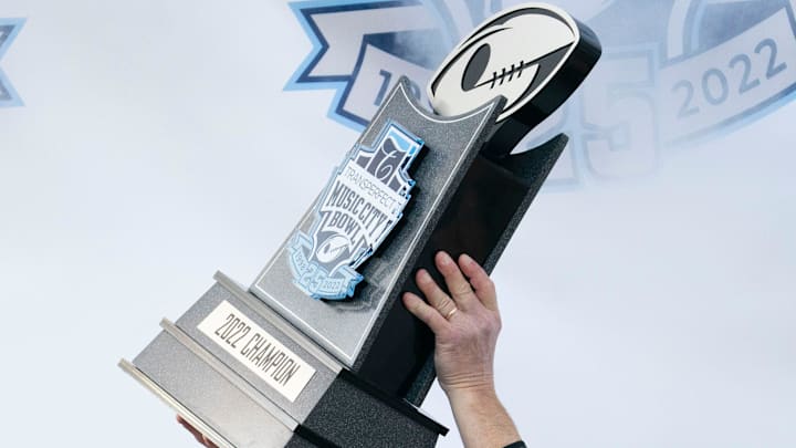 Iowa head coach Kirk Ferentz holds up the championship trophy after defeating Kentucky 21 to 0 in the TransPerfect Music City Bowl against Kentucky at Nissan Stadium Saturday, Dec. 31, 2022, in Nashville, Tenn.
Ncaa Football Music City Bowl Iowa At Kentucky Iowa head coach Kirk Ferentz holds up the championship trophy after defeating Kentucky 21 to 0 in the TransPerfect Music City Bowl against Kentucky at Nissan Stadium Saturday, Dec. 31, 2022, in Nashville, Tenn.
Ncaa Football Music City Bowl Iowa At Kentucky