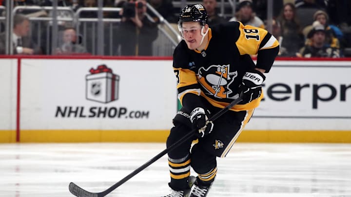 Dec 7, 2024; Pittsburgh, Pennsylvania, USA;  Pittsburgh Penguins right wing Jesse Puljujarvi (18) skates with the puck against the Toronto Maple Leafs during the third period at PPG Paints Arena. Mandatory Credit: Charles LeClaire-Imagn Images