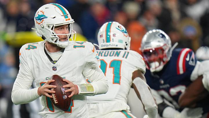 Miami Dolphins quarterback Quinn Ewers (14) drops back to pass against the New England Patriots during the second half at Gillette Stadium in the 2025 season finale. Miami Dolphins quarterback Quinn Ewers (14) drops back to pass against the New England Patriots during the second half at Gillette Stadium in the 2025 season finale.