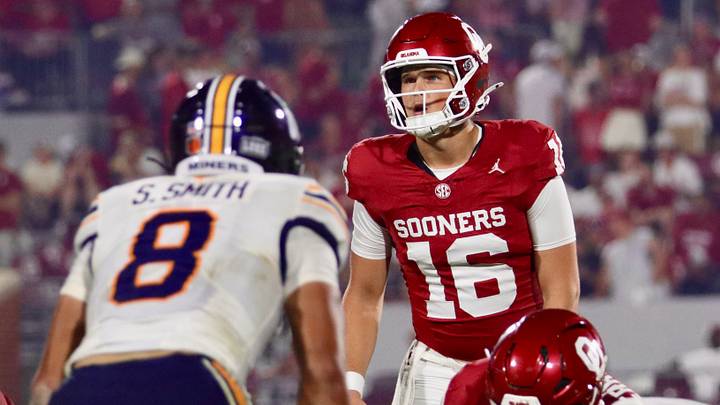 Oklahoma quarterback Whitt Newbauer scans the defense before a snap against UTEP. Oklahoma quarterback Whitt Newbauer scans the defense before a snap against UTEP.