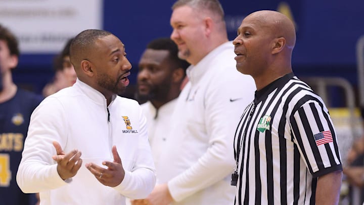 St. Ignatius head coach Cameron Joyce argues a call with an official in the second half against McKinley in the OHSAA Regional Finals held at Kent State’s Mac Center Saturday, March 8, 2025.