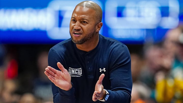 Nov 19, 2024; Lawrence, Kansas, USA; North Carolina-Wilmington Seahawks head coach Takayo Siddle reacts during the second half against the Kansas Jayhawks at Allen Fieldhouse. Mandatory Credit: Jay Biggerstaff-Imagn Images