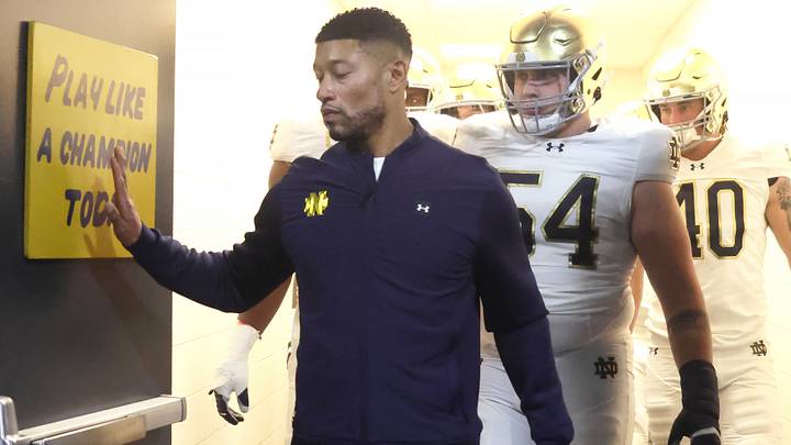 Nov 15, 2025; Pittsburgh, Pennsylvania, USA; Notre Dame Fighting Irish head coach Marcus Freeman leads the team from the locker room to play the Pittsburgh Panthers at Acrisure Stadium. Nov 15, 2025; Pittsburgh, Pennsylvania, USA; Notre Dame Fighting Irish head coach Marcus Freeman leads the team from the locker room to play the Pittsburgh Panthers at Acrisure Stadium.