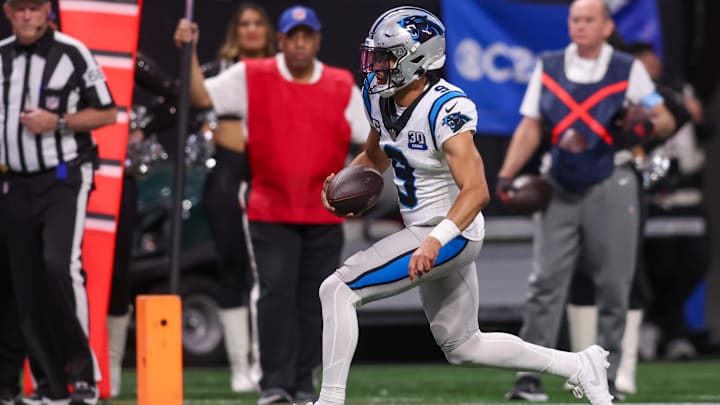 Jan 5, 2025; Atlanta, Georgia, USA; Carolina Panthers quarterback Bryce Young (9) runs the ball for a touchdown against the Atlanta Falcons in the fourth quarter at Mercedes-Benz Stadium. Mandatory Credit: Brett Davis-Imagn Images