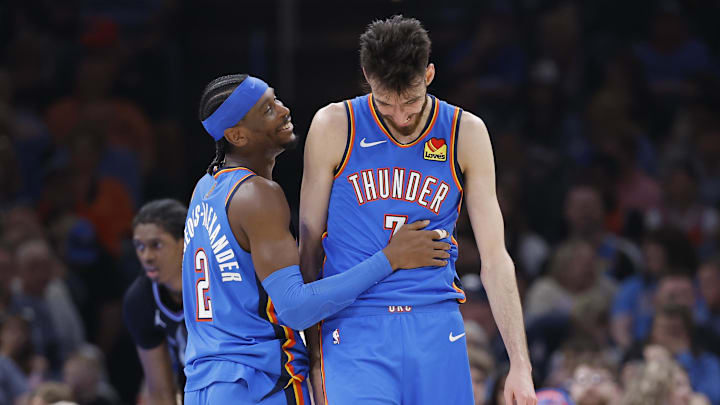 Apr 5, 2026; Oklahoma City, Oklahoma, USA; Oklahoma City Thunder guard Shai Gilgeous-Alexander (2) and center Chet Holmgren (7) laugh after a play against the Utah Jazz during the second half at Paycom Center. Mandatory Credit: Alonzo Adams-Imagn Images