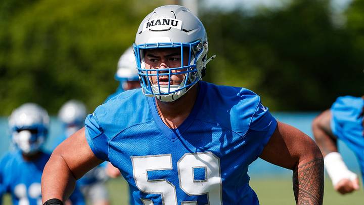 Detroit Lions offensive lineman Giovanni Manu (59) practices during rookie minicamp at Detroit Lions headquarters and practice facility in Allen Park on Friday, May 10, 2024. Detroit Lions offensive lineman Giovanni Manu (59) practices during rookie minicamp at Detroit Lions headquarters and practice facility in Allen Park on Friday, May 10, 2024.