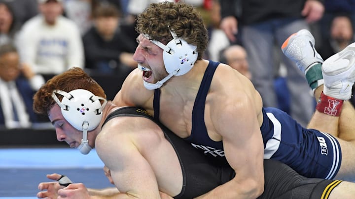 Penn State's Mitchell Mesenbrink celebrates a win over Iowa's Michael Caliendo at the 2025 NCAA Wrestling Championship held at Wells Fargo Center. 