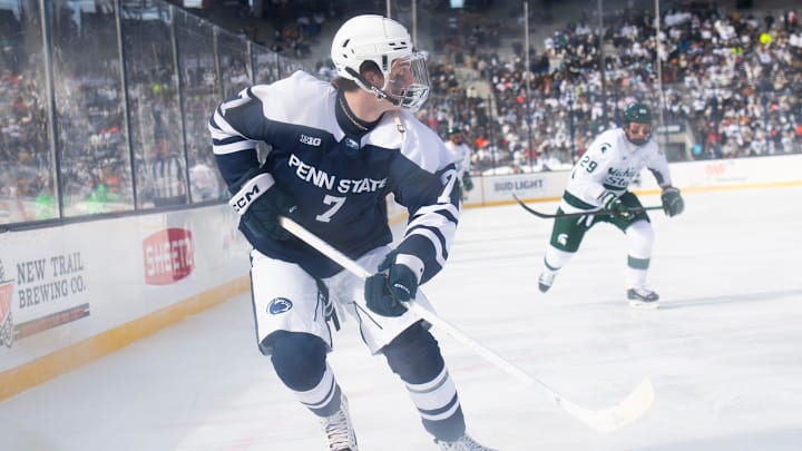Penn State Nittany Lions defenseman Jackson Smith skates during a Big Ten ice hockey game against Michigan State in Beaver Stadium . Penn State Nittany Lions defenseman Jackson Smith skates during a Big Ten ice hockey game against Michigan State in Beaver Stadium .