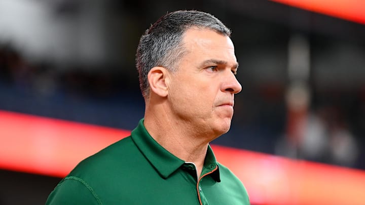 Nov 30, 2024; Syracuse, New York, USA; Miami Hurricanes head coach Mario Cristobal looks on prior to the game against the Syracuse Orange at the JMA Wireless Dome. Mandatory Credit: Rich Barnes-Imagn Images