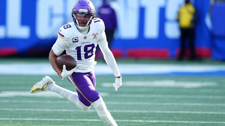Dec 21, 2025; East Rutherford, New Jersey, USA; Minnesota Vikings wide receiver Justin Jefferson (18) makes a catch against the New York Giants during the first half at MetLife Stadium. 