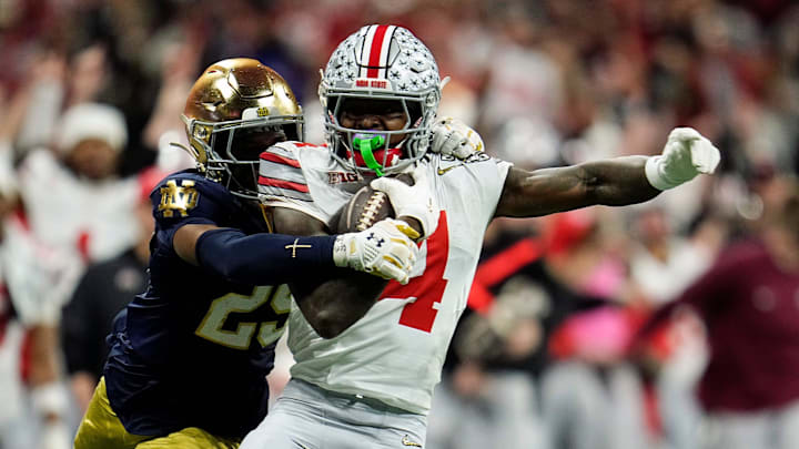 Ohio State Buckeyes wide receiver Jeremiah Smith (4) makes a catch against Notre Dame during the national championship game on January 20, 2025.
