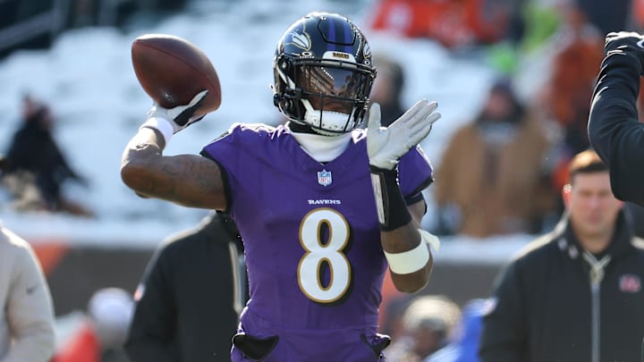 Dec 14, 2025; Cincinnati, Ohio, USA;  Baltimore Ravens quarterback Lamar Jackson (8) warms up before the game against the Cincinnati Bengals at Paycor Stadium. Mandatory Credit: Joseph Maiorana-Imagn Images