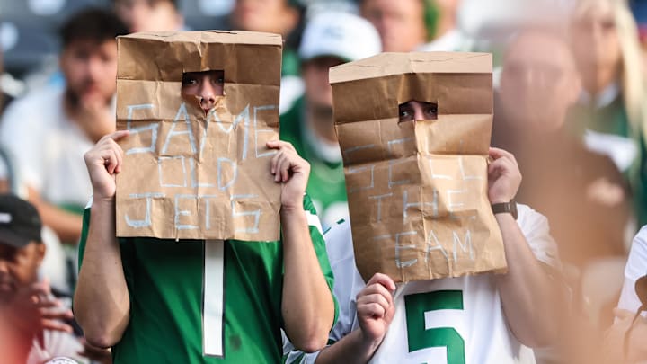 Oct 19, 2025; East Rutherford, New Jersey, USA; A New York Jets fan wears bags while watch during the fourth quarter of an NFL game between the Jets and the Carolina Panthers at MetLife Stadium. Mandatory Credit: Vincent Carchietta-Imagn Images