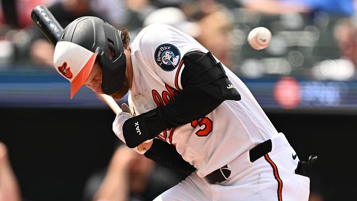 Jul 1, 2026: Baltimore Orioles outfielder Taylor Ward (3) ducks away from the ball while batting in the sixth inning against the Chicago White Sox at Oriole Park at Camden Yards. Mandatory Credit: Jamie Sabau-Imagn Images