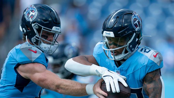 Tennessee Titans quarterback Will Levis (8) hands off to Tennessee Titans running back Tony Pollard (20) during warmups before their game against the Green Bay Packers at Nissan Stadium in Nashville, Tenn., Sunday, Sept. 22, 2024. Tennessee Titans quarterback Will Levis (8) hands off to Tennessee Titans running back Tony Pollard (20) during warmups before their game against the Green Bay Packers at Nissan Stadium in Nashville, Tenn., Sunday, Sept. 22, 2024.