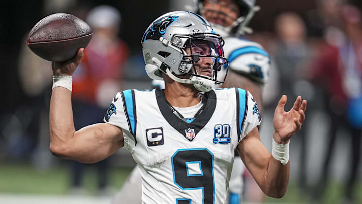 Carolina Panthers quarterback Bryce Young (9) passes on the run against the Atlanta Falcons during the second half at Mercedes-Benz Stadium. 