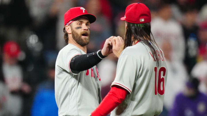 May 12, 2023; Denver, Colorado, USA; Philadelphia Phillies designated hitter Bryce Harper (3) and center fielder Brandon Marsh (16) celebrate defeating the Colorado Rockies at Coors Field May 12, 2023; Denver, Colorado, USA; Philadelphia Phillies designated hitter Bryce Harper (3) and center fielder Brandon Marsh (16) celebrate defeating the Colorado Rockies at Coors Field