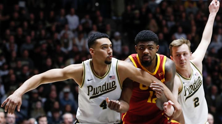 Purdue Boilermakers forward Trey Kaufman-Renn (4) and Purdue Boilermakers guard Fletcher Loyer (2) box out 