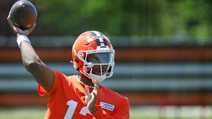 Cleveland Browns quarterback Shedeur Sanders (12) throws during day two of NFL rookie minicamp at the Cleveland Browns training facility on Saturday, May 10, 2025, in Berea, Ohio.