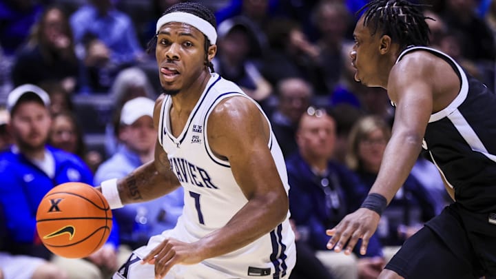 Xavier Musketeers guard Ryan Conwell (7) dribbles against the Providence Friars in the first half at Cintas Center. Xavier Musketeers guard Ryan Conwell (7) dribbles against the Providence Friars in the first half at Cintas Center.