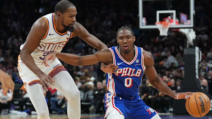 Nov 4, 2024; Phoenix, Arizona, USA; Philadelphia 76ers guard Tyrese Maxey (0) dribbles against Phoenix Suns forward Kevin Durant (35) during the second half at Footprint Center. Mandatory Credit: Joe Camporeale-Imagn Images Nov 4, 2024; Phoenix, Arizona, USA; Philadelphia 76ers guard Tyrese Maxey (0) dribbles against Phoenix Suns forward Kevin Durant (35) during the second half at Footprint Center. Mandatory Credit: Joe Camporeale-Imagn Images