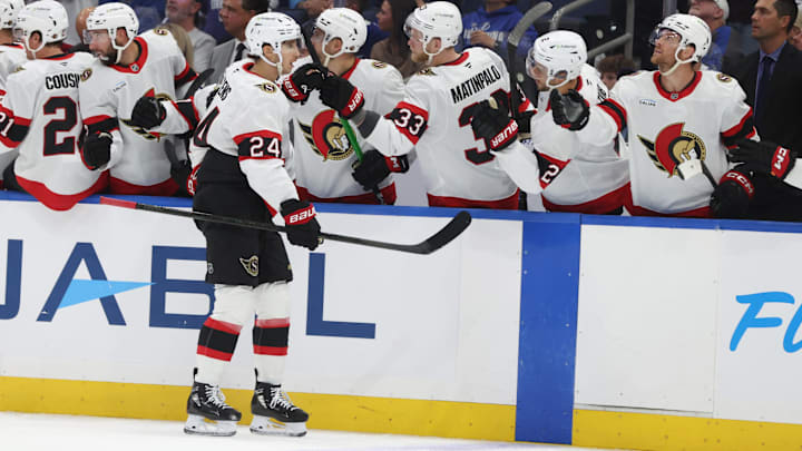 Oct 9, 2025; Tampa, Florida, USA; Ottawa Senators center Dylan Cozens (24) is congratulated after he scored a goal against the Tampa Bay Lightning during the first period at Benchmark International Arena. Mandatory Credit: Kim Klement Neitzel-Imagn Images