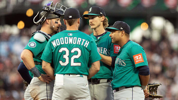 The Seattle Mariners conduct a mound visit during a game against the San Francisco Giants on April 5 at Oracle Park.